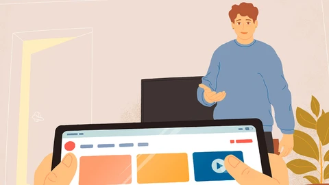 En voksen henvender sig til et barn, der sidder med en tablet.